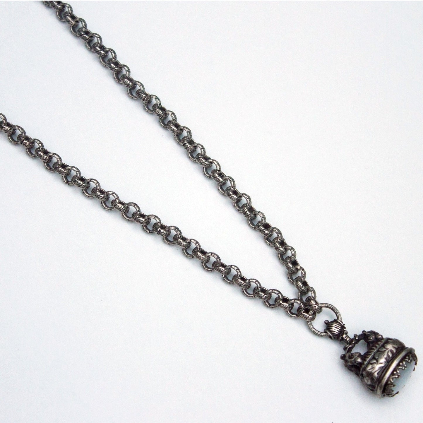 Silvertone Emblem Necklace Jewelry